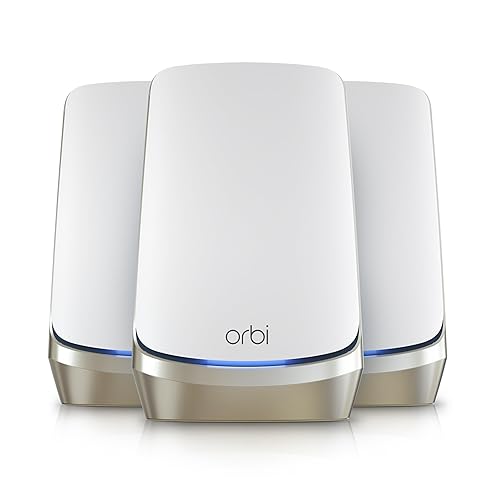 NETGEAR Orbi Quad-Band WiFi 6E Mesh System (RBKE963), Router with 2 Satellite Extenders, Coverage up to 9,000 sq. ft., 200 Devices, 10 Gig Internet Port, AXE11000 802.11 Axe (Up to 10.8Gbps)