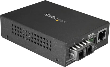 StarTech.com Singlemode (SM) SC Fiber Media Converter for 10/100/1000 Network - 10km - Gigabit Ethernet - 1310nm - w/Auto Negotiation (MCMGBSCSM10) 1"x4.1"x2.8" No Chassis Mount