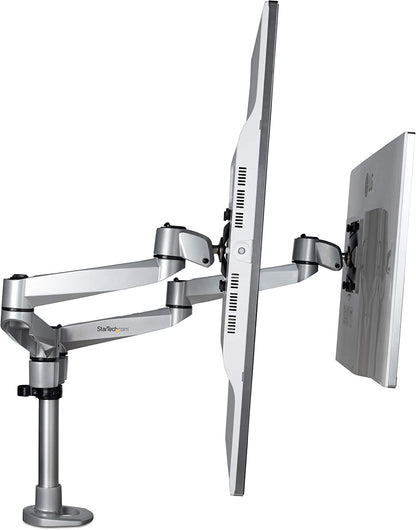 StarTech.com Desk Mount Dual Monitor Arm - Premium Articulating Monitor Arm - up to 27 VESA Mount Displays - Height Adjustable Monitor Mount - Rotate/Tilt/Swivel - Clamp/Grommet - Silver (ARMDUALPS)